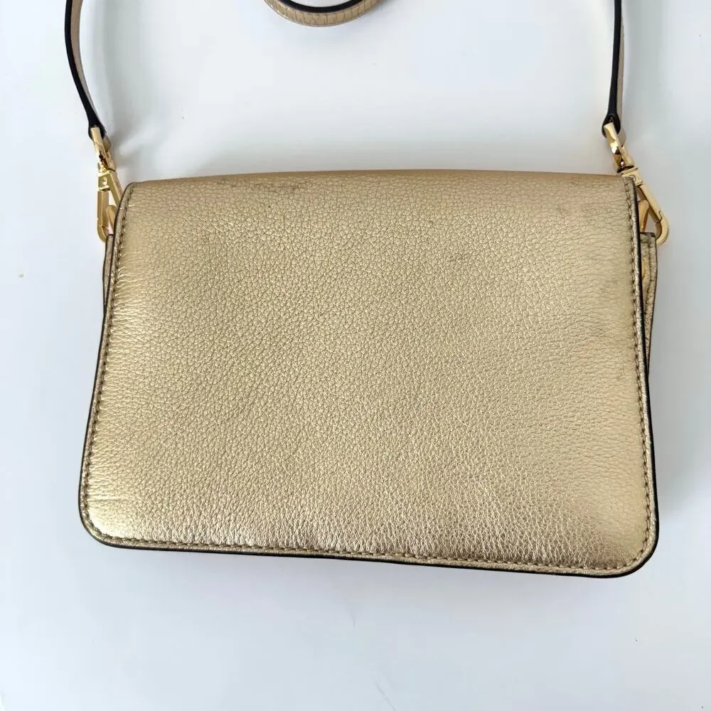 Tory Burch magnetic closure